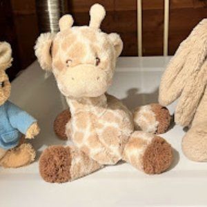 Stuffed animals, like new: Eeyore, long-eared rabbit, Peter Rabbit, baby giraffe